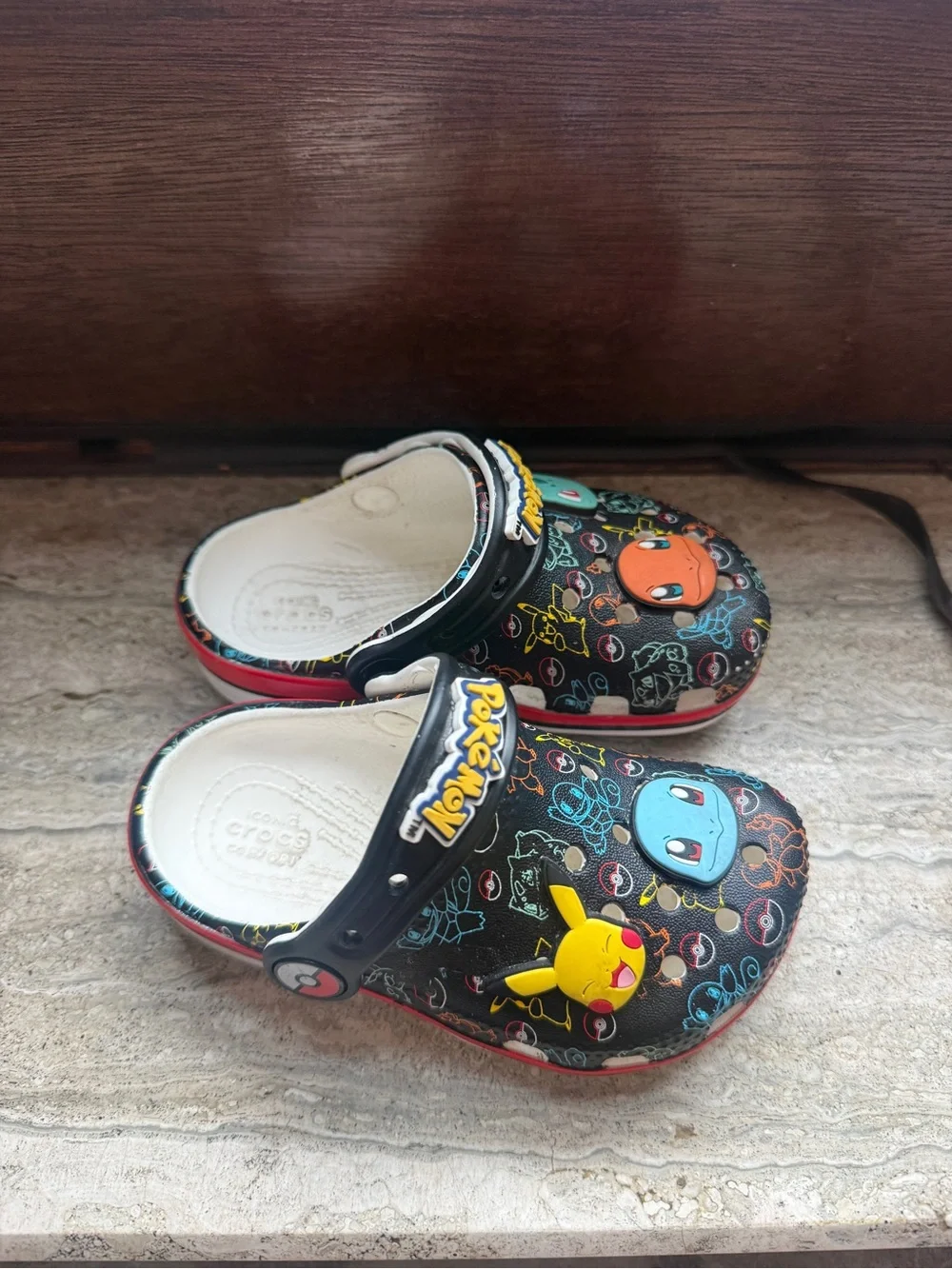 CROCS Black Kids' Pokémon Character Clogs with Yellow Blue Orange Green Accents
